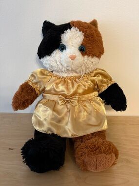 Plush Calico Cat in Gold Dress